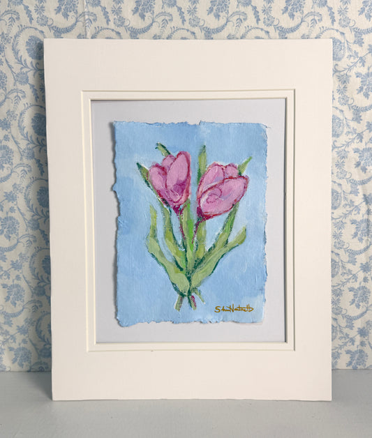 Original pink tulip painting by Sheri Hartnett — acrylic and pastel on handmade deckled-edge paper, shown matted in a cream 11×14 double mat.